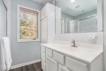 Master bathroom with a walk-in shower